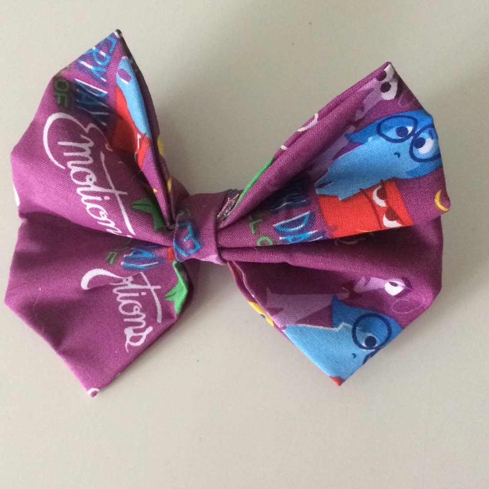 FREE WITH ANY PURCHASE “Inside Out" hair clip bow